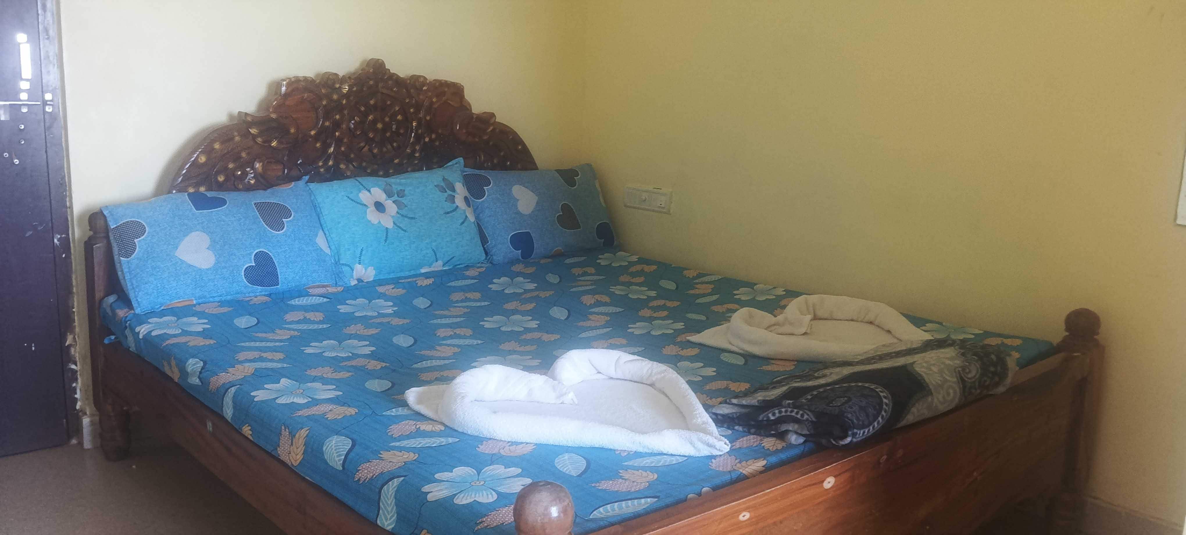 Hotel O Nandhini Guest House - Tap to explore photos