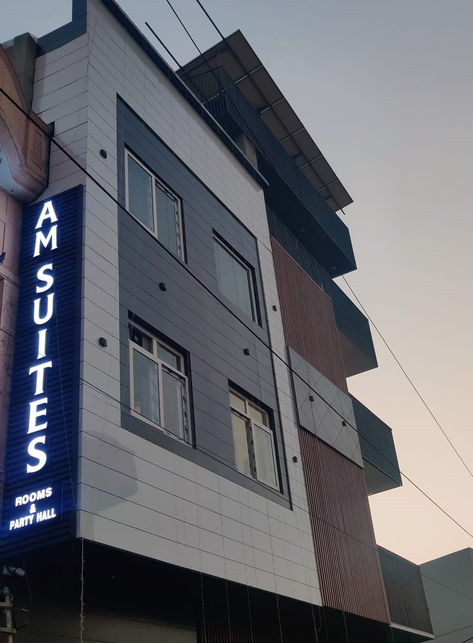 A M Suites - Tap to explore photos