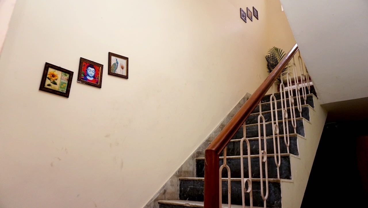 Hotel O Home Happy Homestay - Tap to explore photos