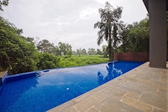 tisyastays | Spacious 1BHK Apartment with Infinity Pool, 5mins to beach, Goa