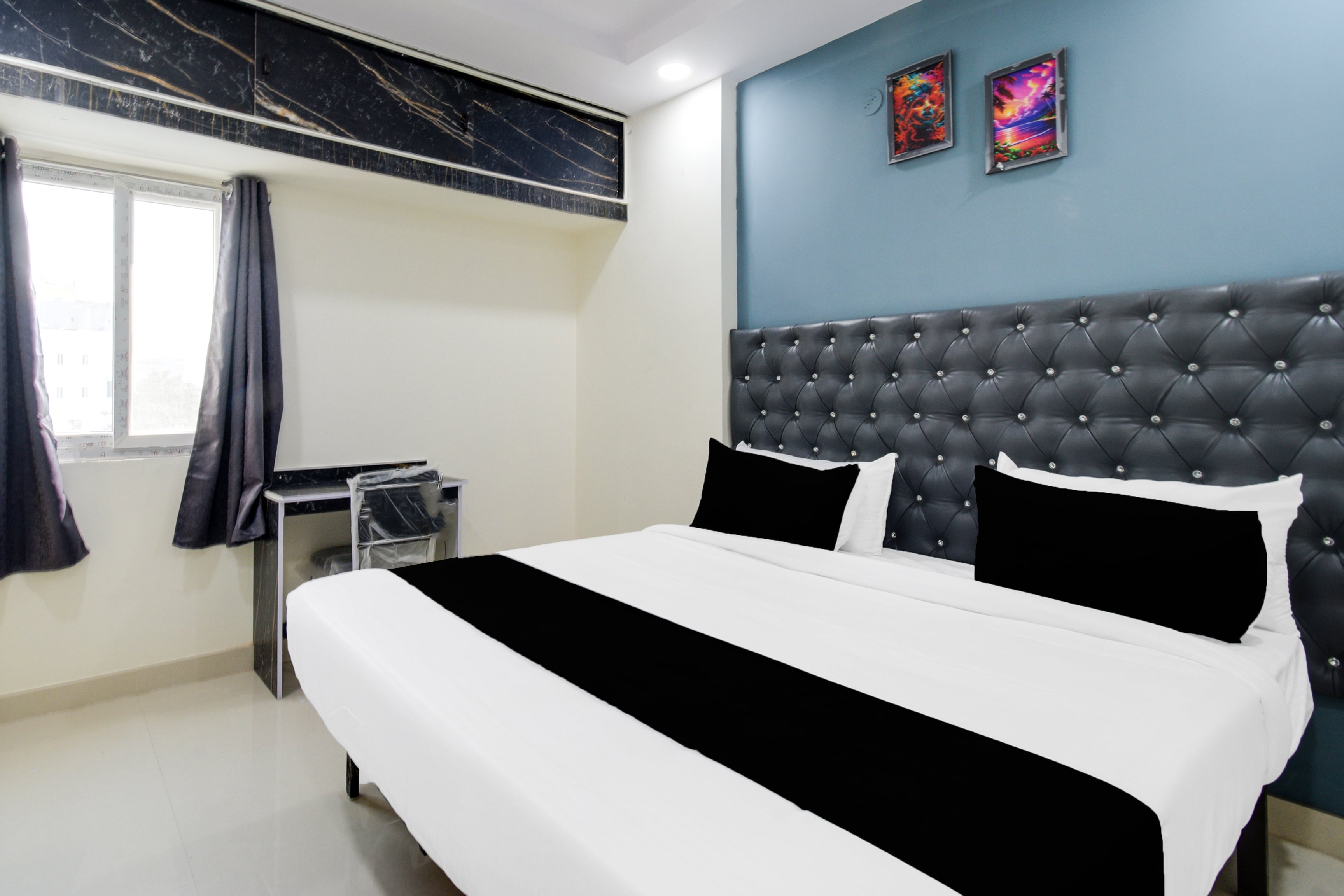 Hotel O SBR Hafeezpet - Tap to explore photos