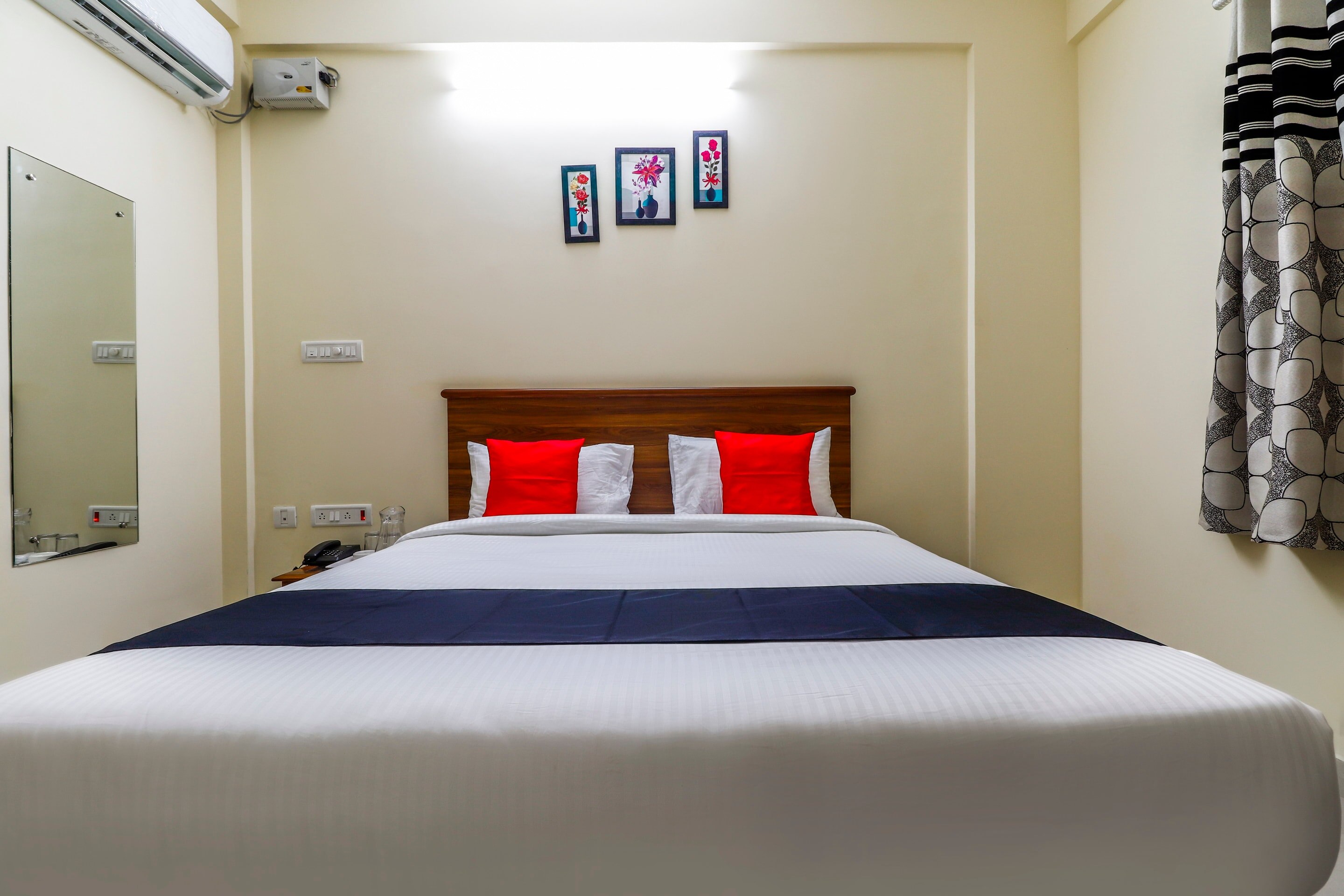 Capital O SLN Residency - Tap to explore photos