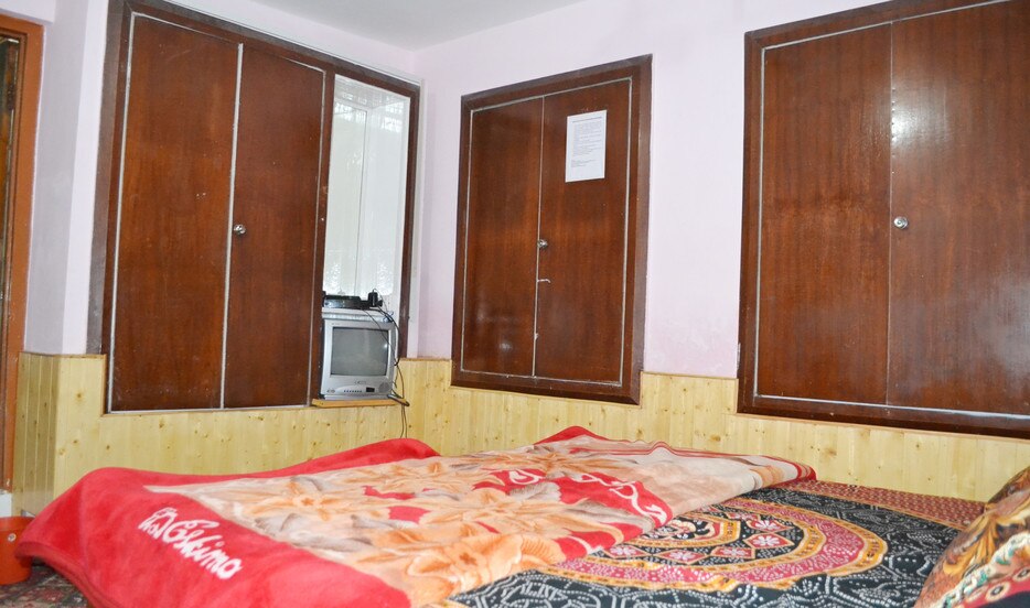 New Taj Guest House - Tap to explore photos
