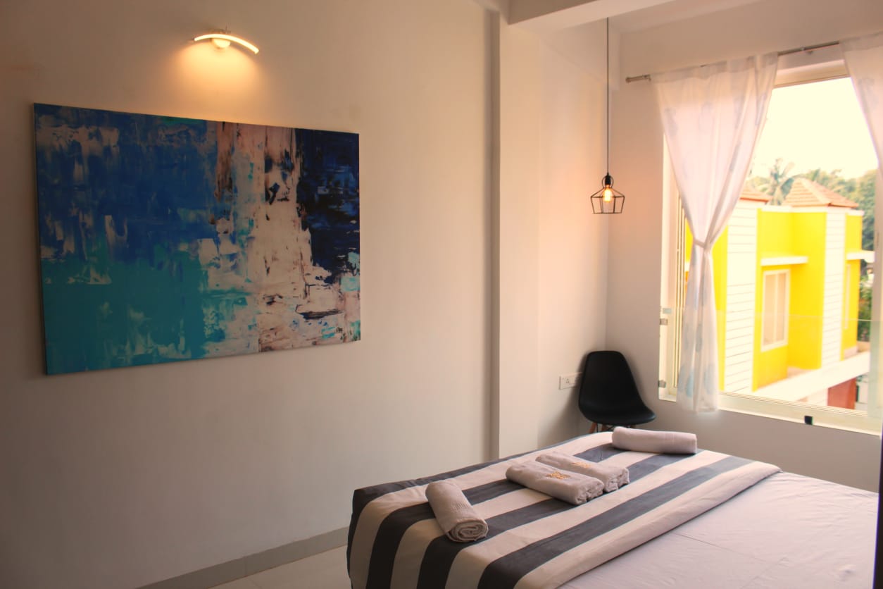 Ocean Vista Comfy 1bhk in Vagator - Tap to explore photos