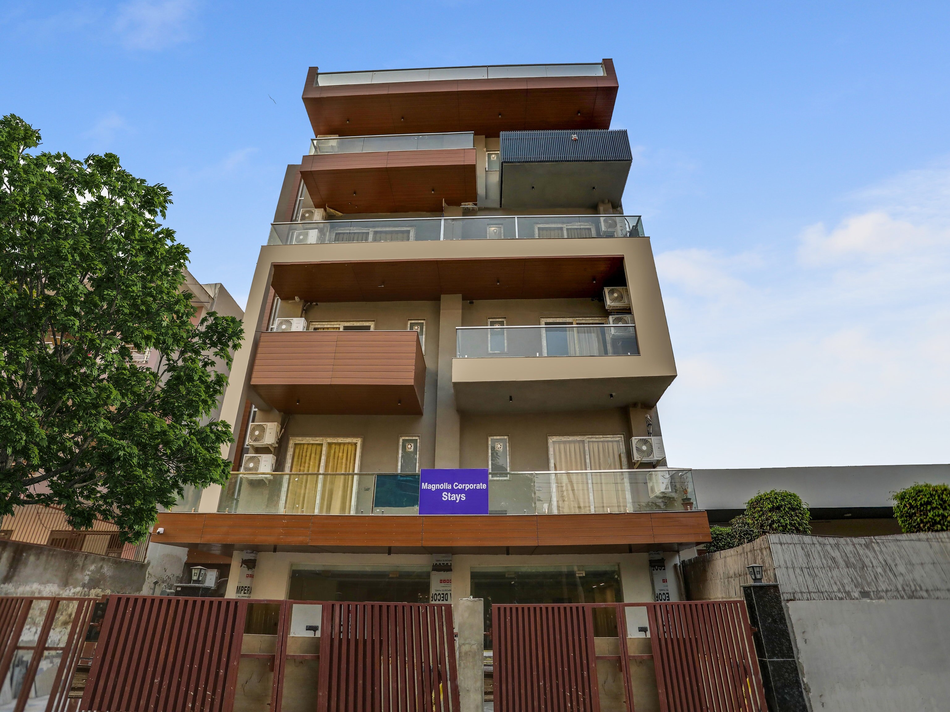 OYO 818360 Magnolia Corporate Stays - Tap to explore photos