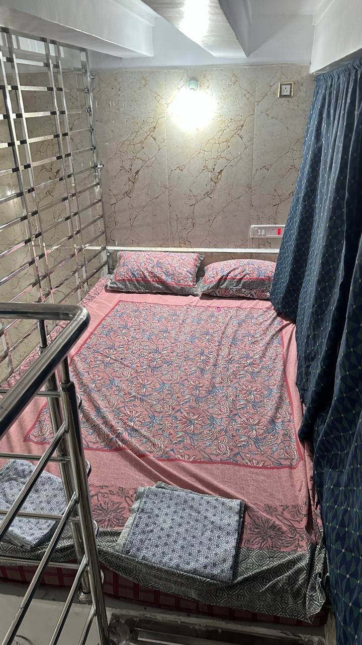 Duplex Rooms at Temple view Home Stay - Tap to explore photos