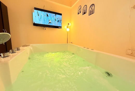 Luxury 1 BHK   Private Jacuzzi   Big Screen Fun