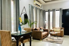 Entire 1BHK Apartment by Bluo at DLF Galleria Market, Gurgaon