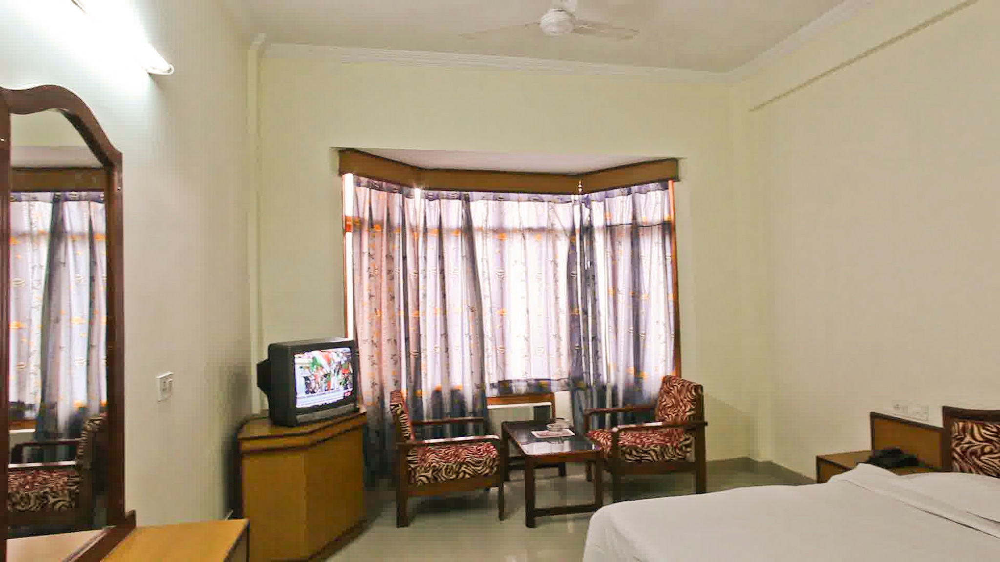 Hotel New Ashok - Tap to explore photos